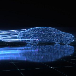 Un modelo en 3D de un coche formado por puntos.luminosos